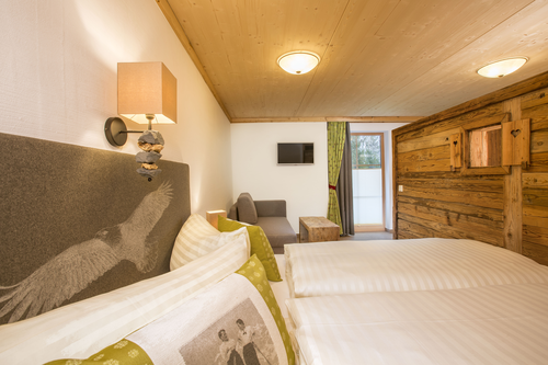 Gemütliches Doppelbett im Appartement Adlerhorst (c) Photoart Faistauer (Naturdorf Oberkühnreit)